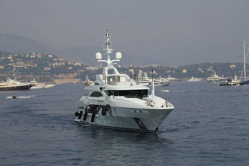 a large white boat in the water aboard OCEAN PARADISE Yacht for Sale