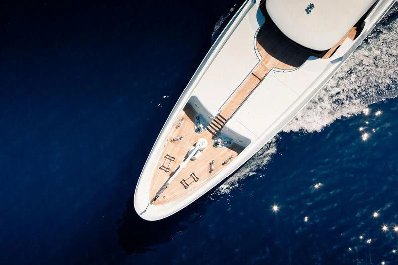 a space shuttle flying over a planet aboard OCEAN PARADISE Yacht for Sale