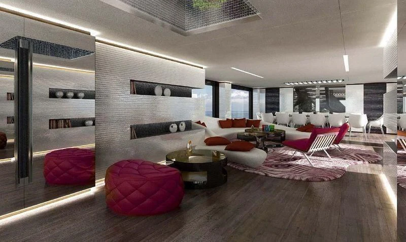 a room with a couch and a table aboard OCEAN PARADISE Yacht for Sale