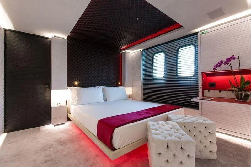 a bed in a room aboard OCEAN PARADISE Yacht for Sale