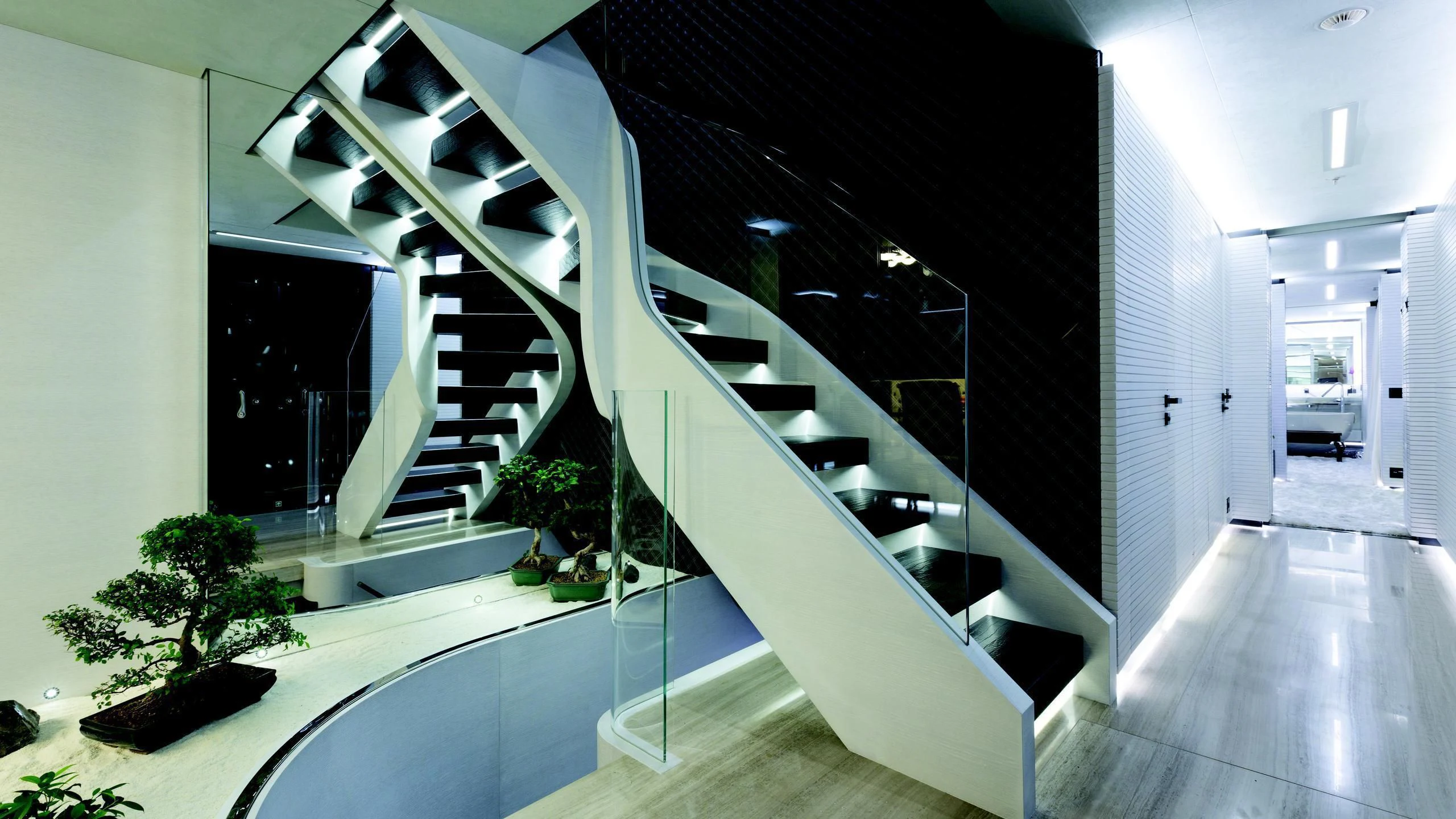 a modern house with a staircase aboard OCEAN PARADISE Yacht for Sale