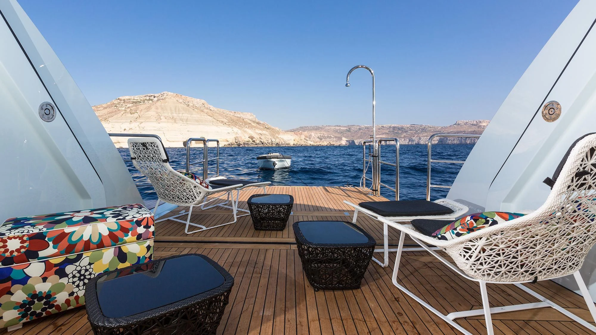 a boat on a deck aboard OCEAN PARADISE Yacht for Sale