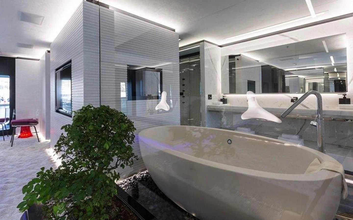a large jacuzzi in a room aboard OCEAN PARADISE Yacht for Sale