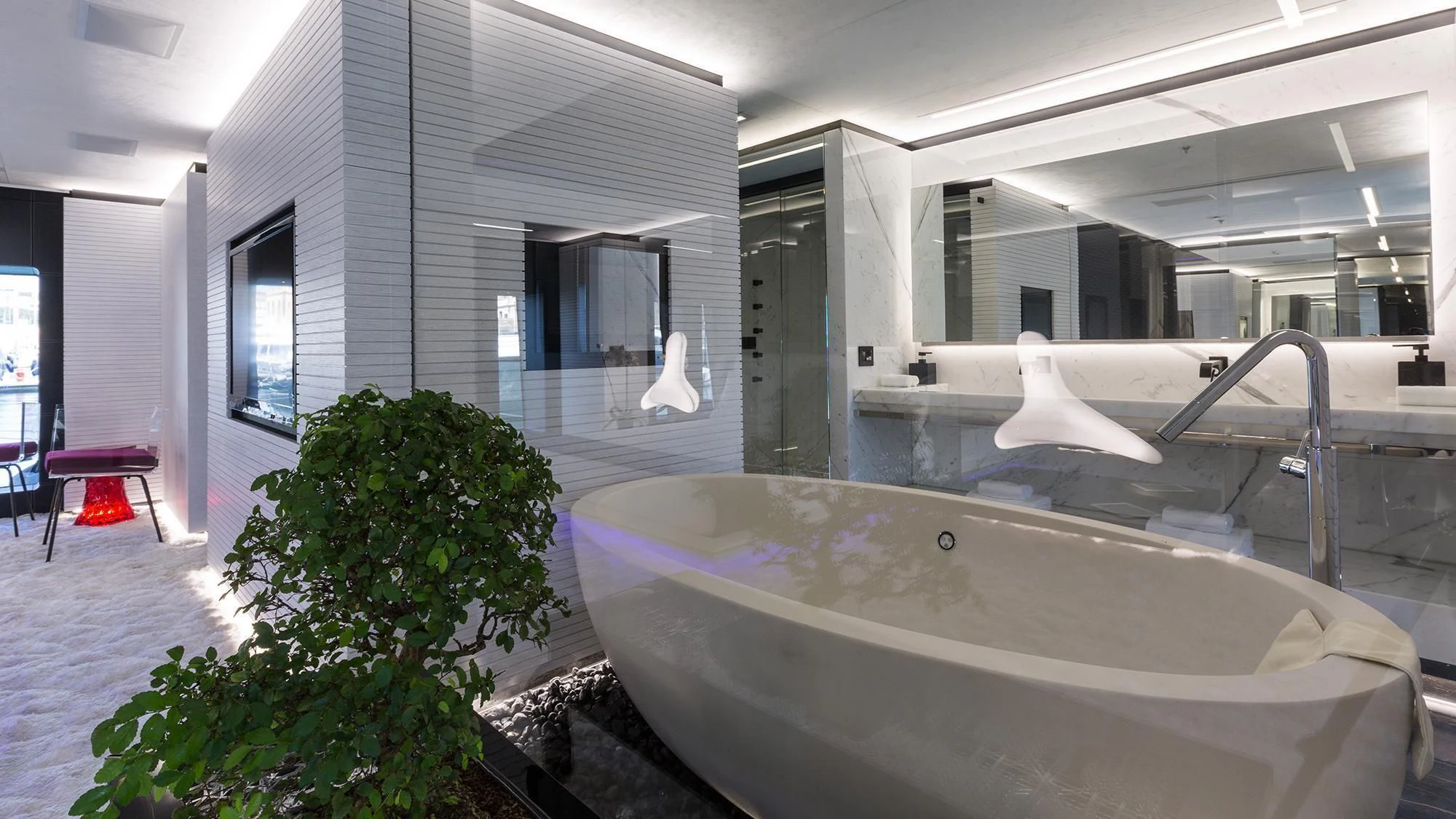 a large jacuzzi in a room aboard OCEAN PARADISE Yacht for Sale