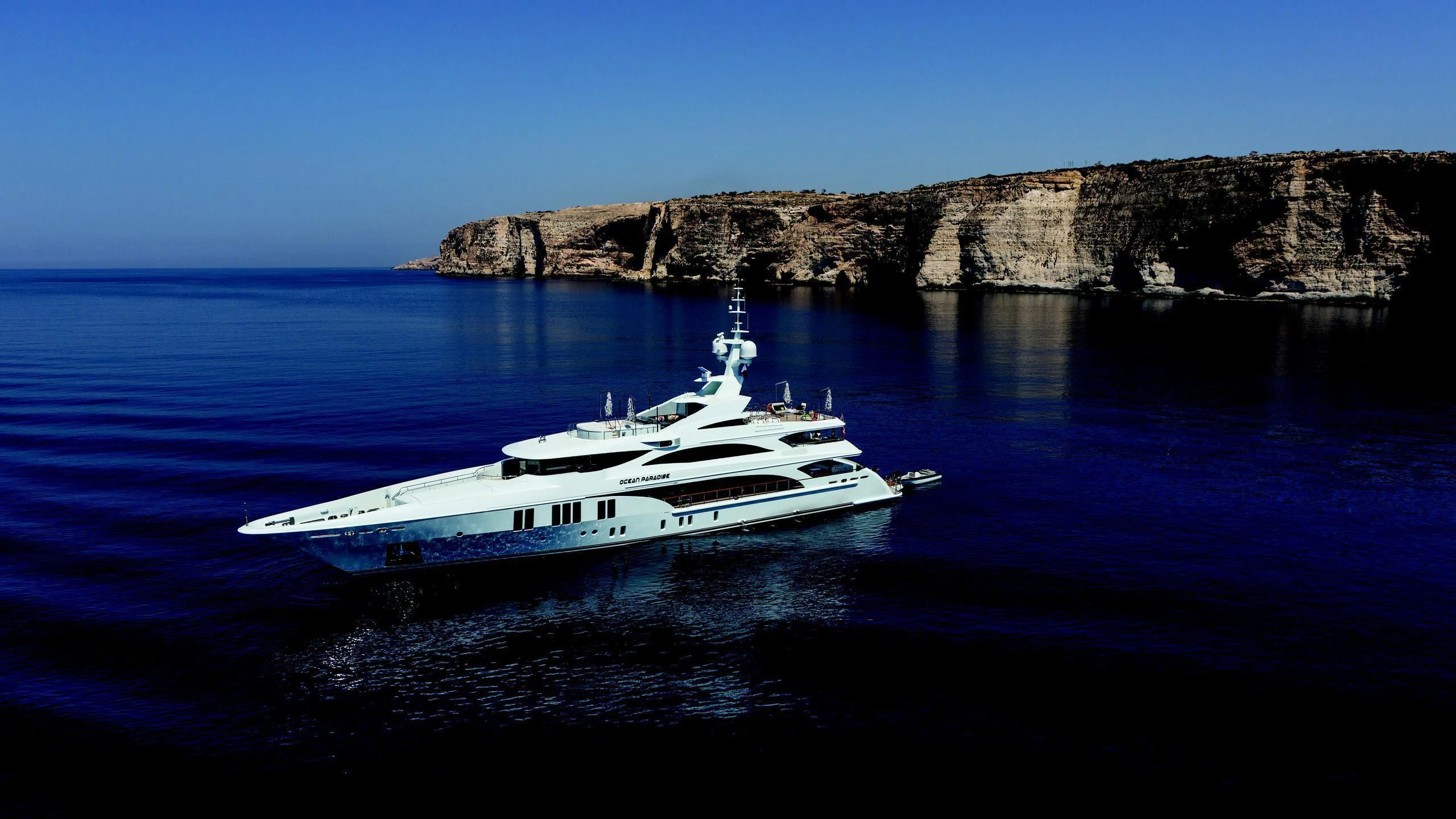 a boat in the water aboard OCEAN PARADISE Yacht for Sale