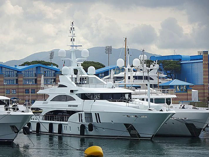 a group of boats in a harbor aboard OCEAN PARADISE Yacht for Sale