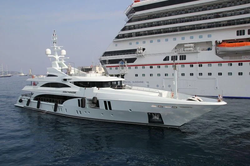 a large white ship in the water aboard OCEAN PARADISE Yacht for Sale