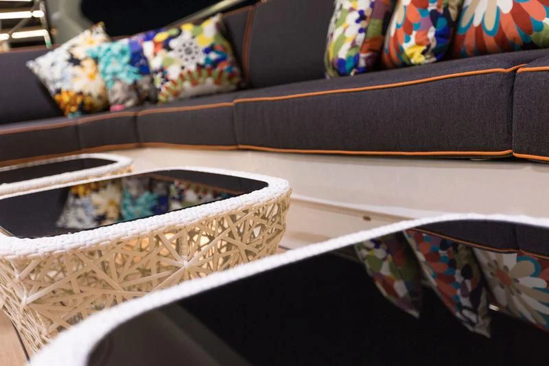 a pair of sunglasses on a table aboard OCEAN PARADISE Yacht for Sale