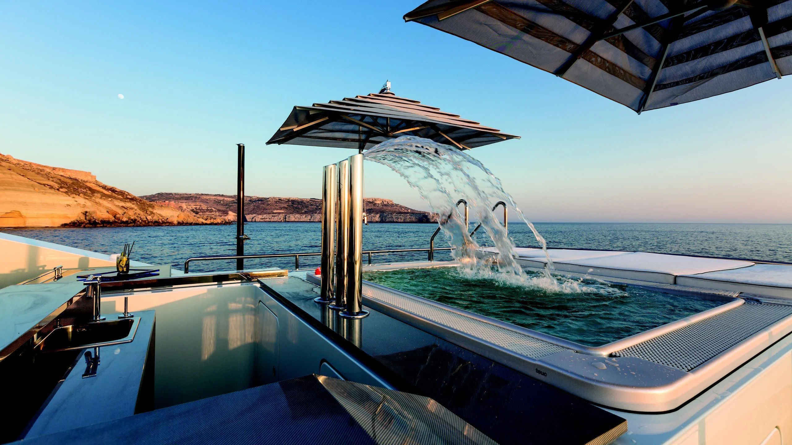 a boat on the water aboard OCEAN PARADISE Yacht for Sale