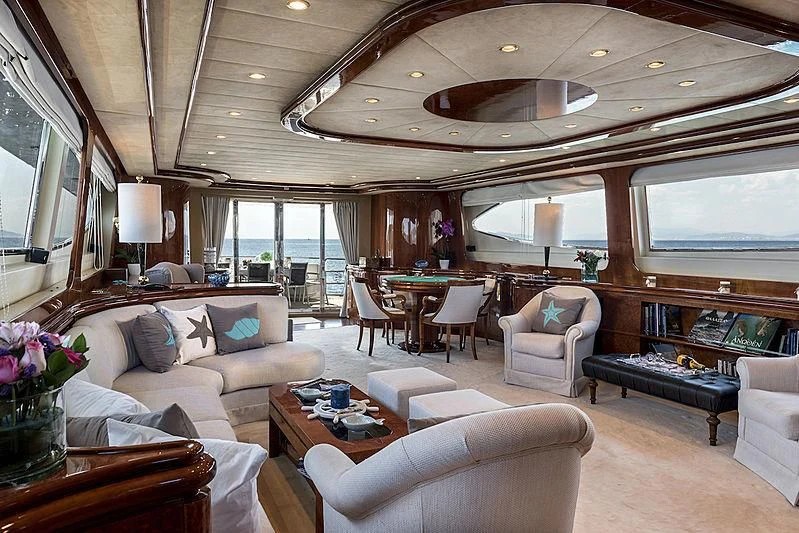 a living room with a large window aboard SUGAR Yacht for Sale