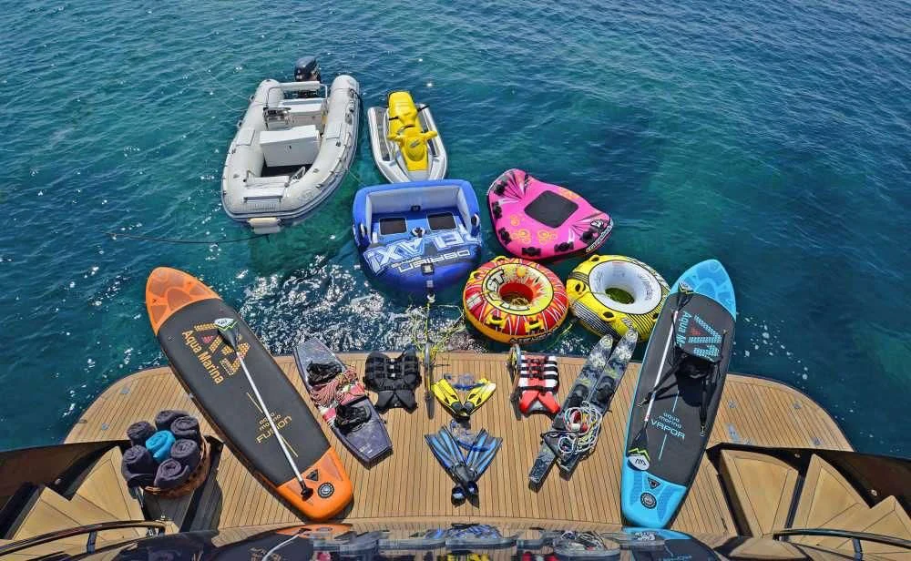 a large group of boats on the water aboard SUGAR Yacht for Sale
