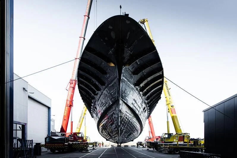 a large black object with a red crane on top aboard SPECIAL ONE Yacht for Sale