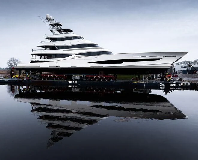 a large white yacht docked at a dock aboard SPECIAL ONE Yacht for Sale