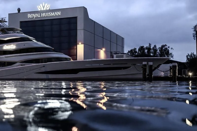 a building with a large glass front aboard SPECIAL ONE Yacht for Sale