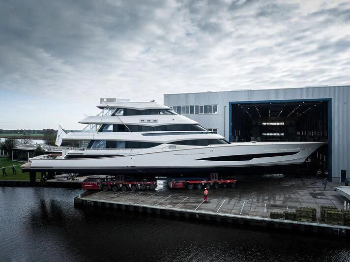 a large yacht docked at a dock aboard SPECIAL ONE Yacht for Sale