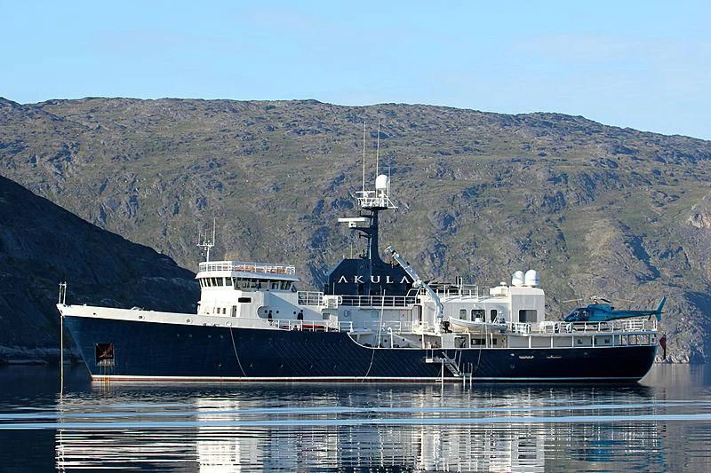 a large ship in the water aboard OMNIA Yacht for Sale