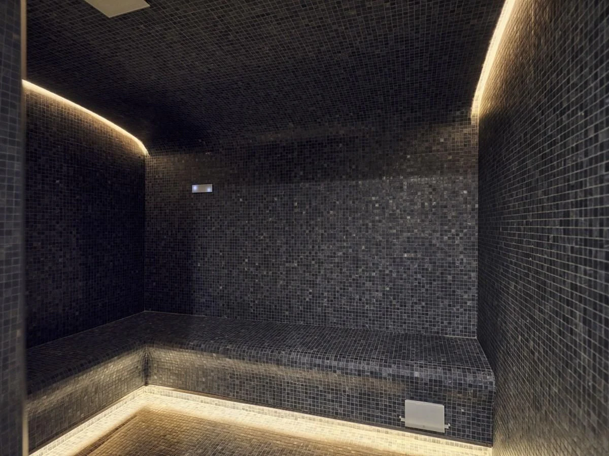 a black tiled surface aboard OMNIA Yacht for Sale