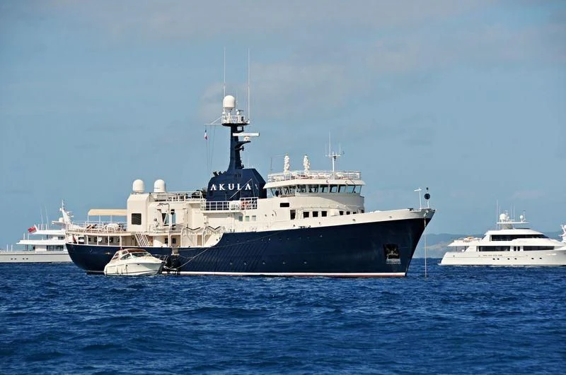 a large ship in the water aboard OMNIA Yacht for Sale