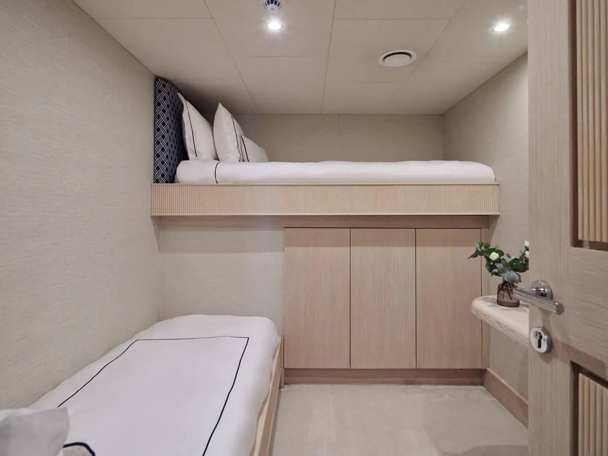a bathroom with a tub and toilet aboard OMNIA Yacht for Sale