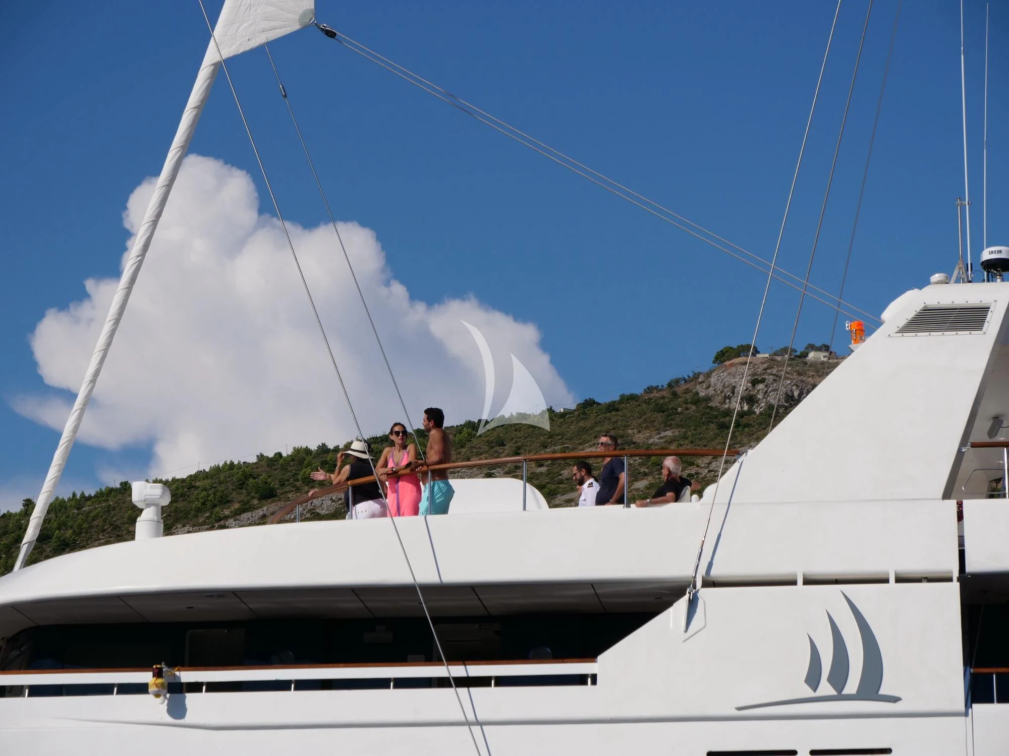 a group of people on a boat aboard LE PONANT Yacht for Charter