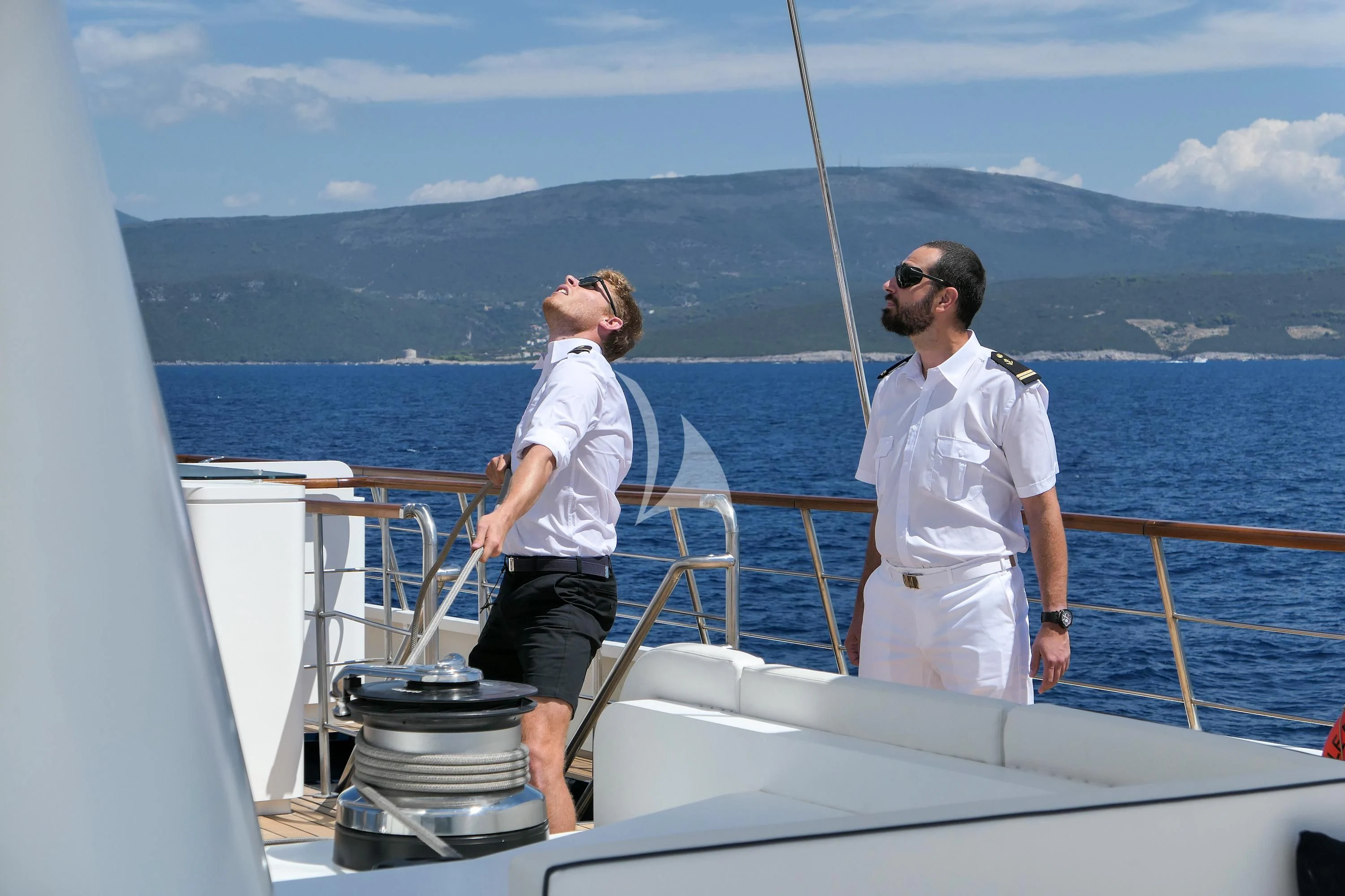 a man and woman on a boat aboard LE PONANT Yacht for Charter