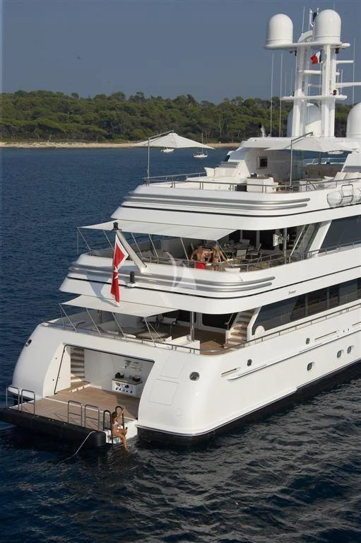 a white boat on the water aboard HURRICANE RUN Yacht for Charter