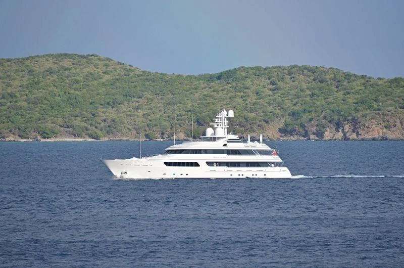 a white boat on the water aboard HURRICANE RUN Yacht for Charter