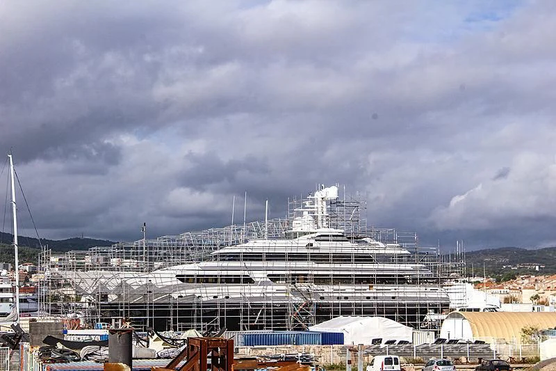 a large cruise ship docked aboard HURRICANE RUN Yacht for Charter