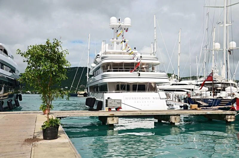 a boat docked at a pier aboard HURRICANE RUN Yacht for Charter