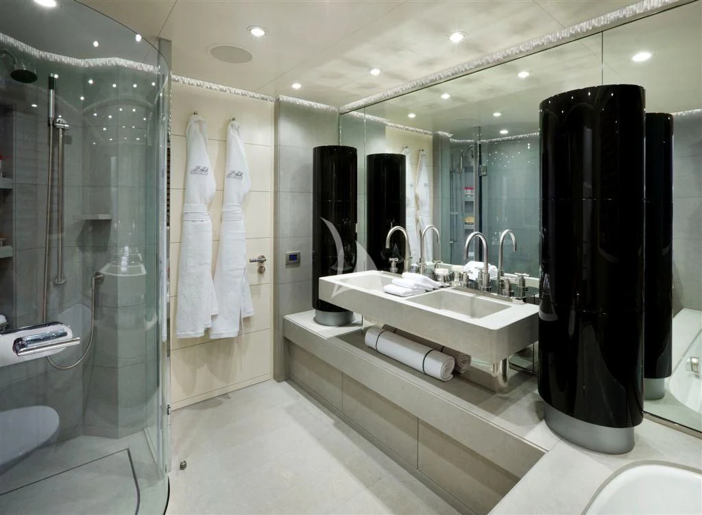 a bathroom with a large glass shower aboard HURRICANE RUN Yacht for Charter