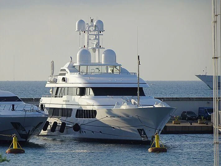 a large white boat in the water aboard HURRICANE RUN Yacht for Charter