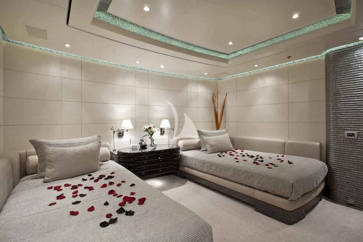 a room with two beds aboard HURRICANE RUN Yacht for Charter