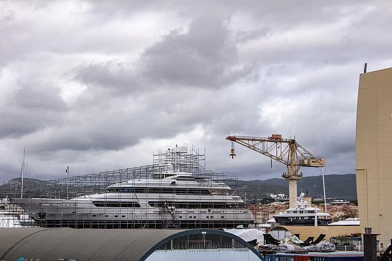 a large cruise ship docked aboard HURRICANE RUN Yacht for Charter