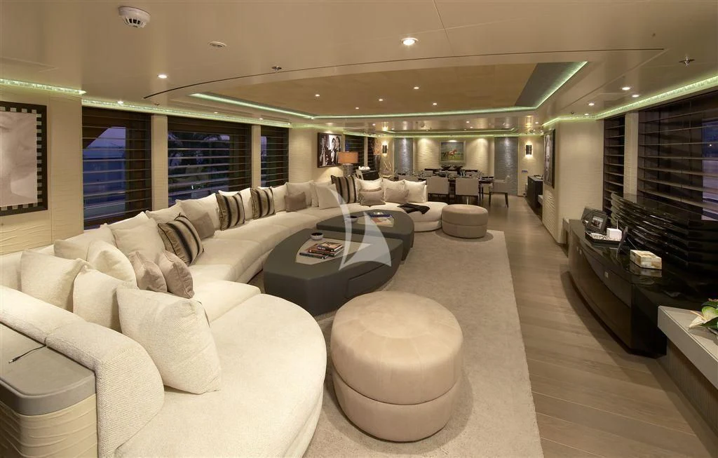 a living room with a large window aboard HURRICANE RUN Yacht for Charter