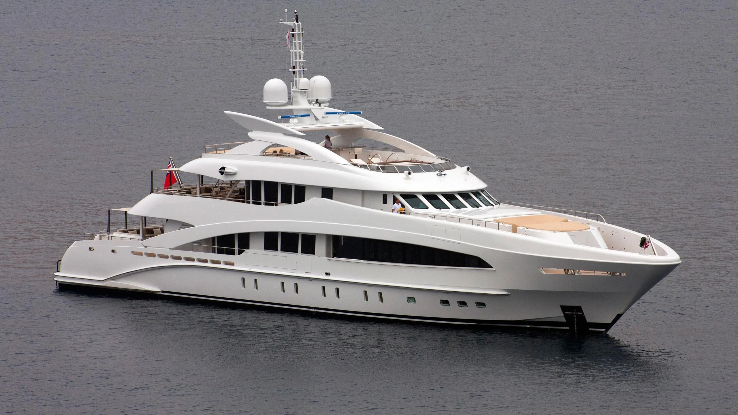 a white yacht in the water aboard KNIGHT Yacht for Charter