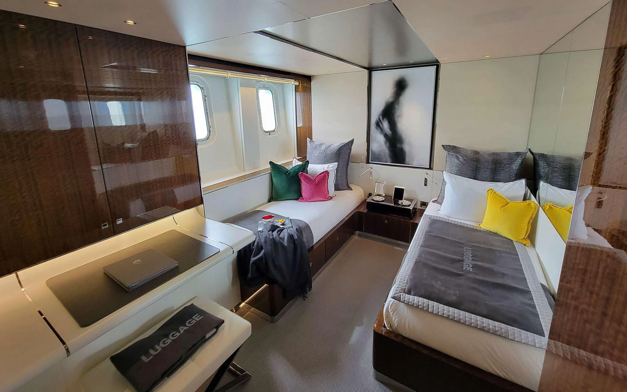a room with a bed and a tv aboard KNIGHT Yacht for Charter