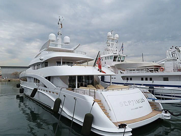 a large white boat in the water aboard KNIGHT Yacht for Charter