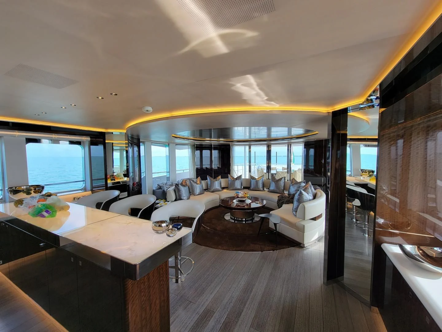 a room with a large table and chairs aboard KNIGHT Yacht for Charter