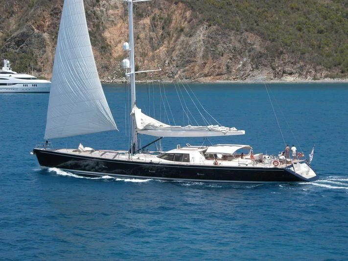 a boat sailing on the water aboard VAIMITI Yacht for Sale