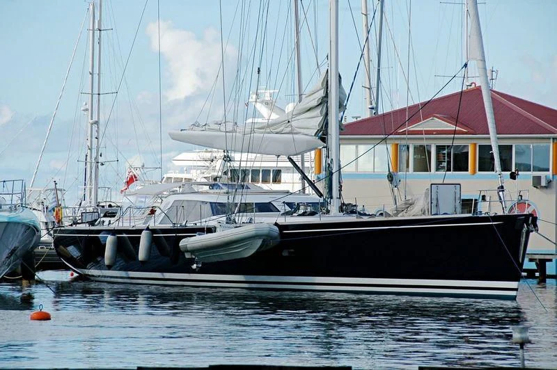 a couple of boats are parked in the water aboard VAIMITI Yacht for Sale