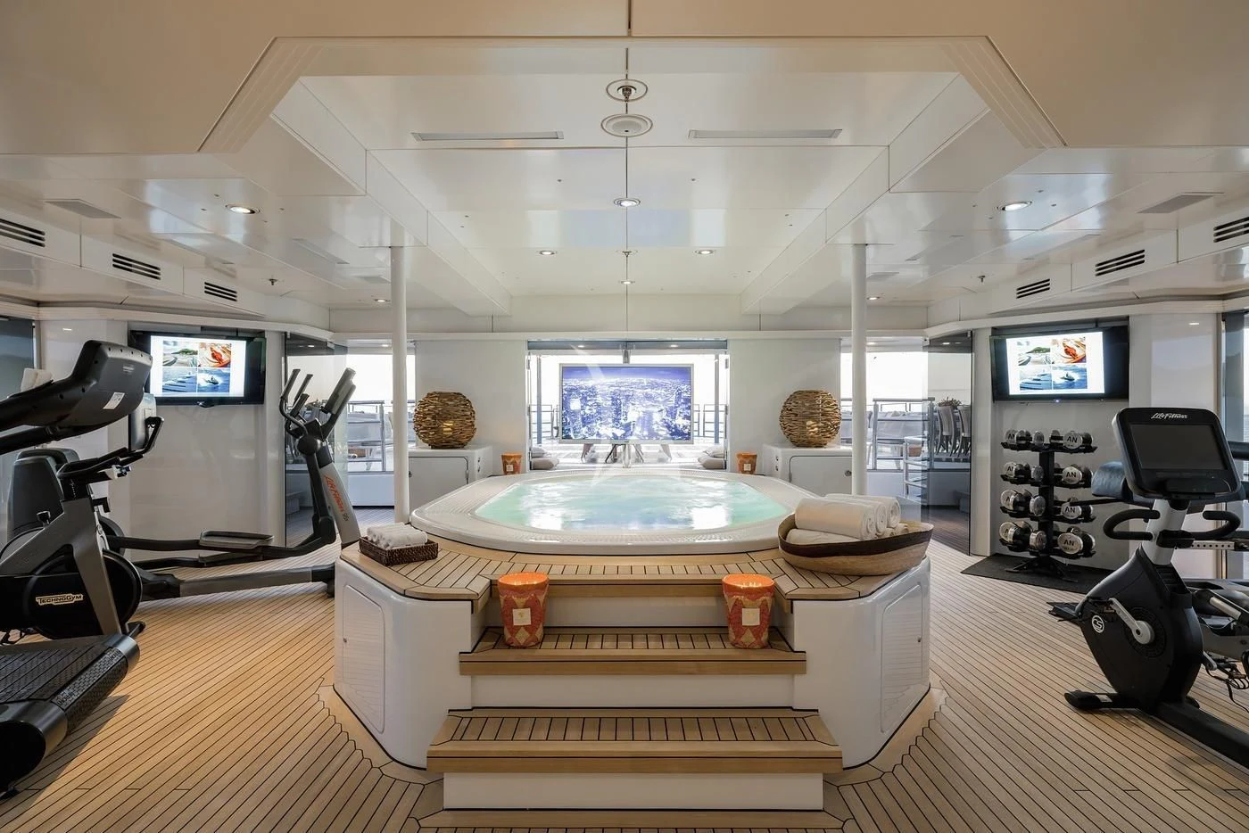 a room with a large tub and a bench aboard NAIA Yacht for Sale