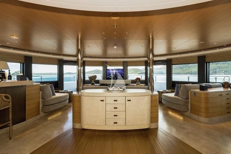 a room with a large window and a wood floor aboard NAIA Yacht for Sale