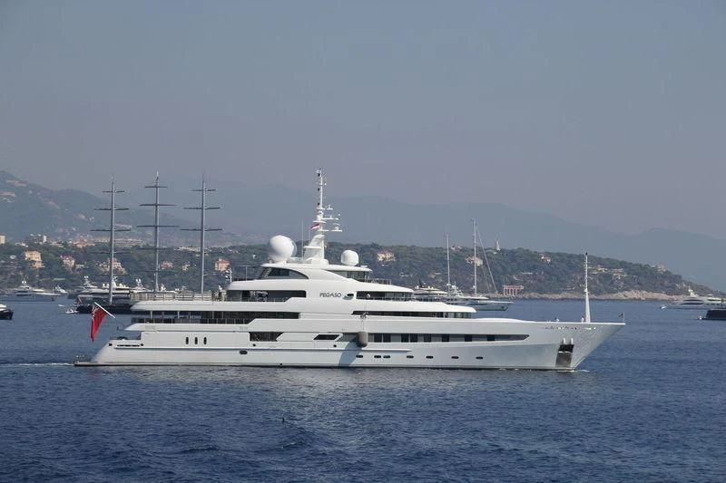 a large white ship in the water aboard NAIA Yacht for Sale
