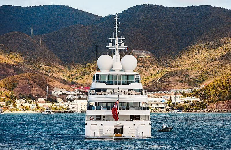 a boat sailing on the water aboard NAIA Yacht for Sale