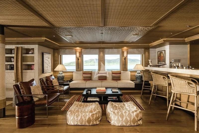 a living room with a large open floor plan aboard NAIA Yacht for Sale