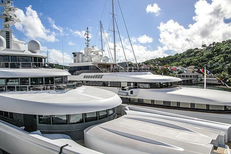 a group of boats in a harbor aboard NAIA Yacht for Sale