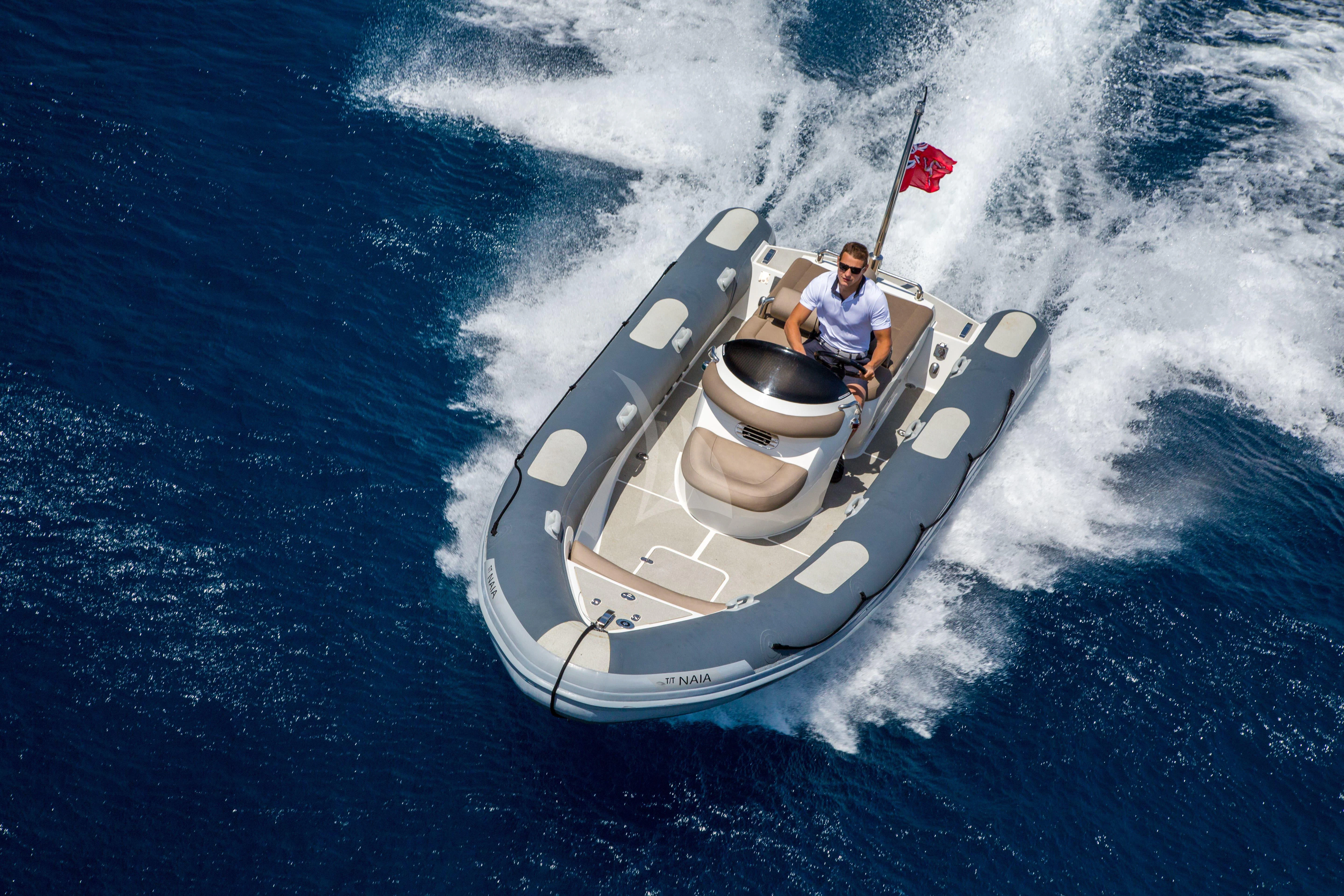 a person on a jet ski aboard NAIA Yacht for Sale