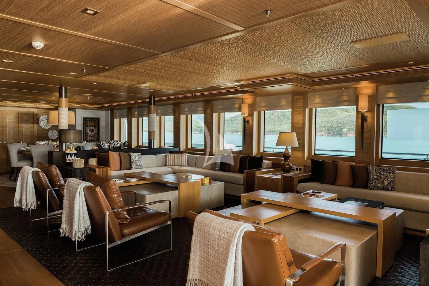 a living room with a large window aboard NAIA Yacht for Sale