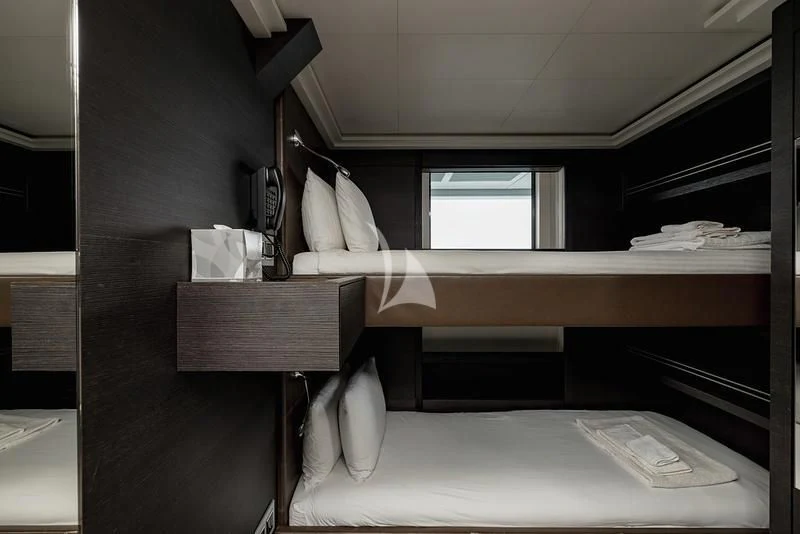 a room with a desk and a chair aboard NAIA Yacht for Sale