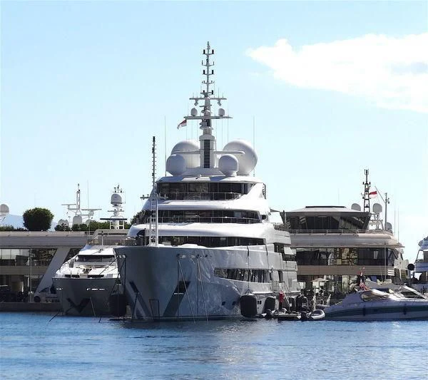 a large ship in the water aboard NAIA Yacht for Sale